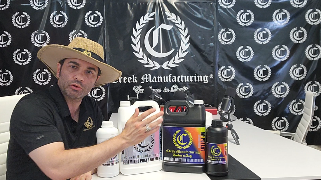 Special Sample bottle with blue, gold, and black labels, DTG Printer Parts branding on a black backdrop with laurel logos