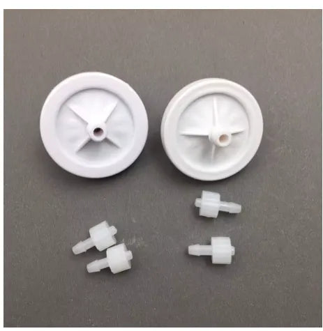 DTG/DTF Ink Filter White + CMYK featuring white plastic filters with cross spokes, small translucent plugs; DTG Printer Parts