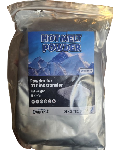 A 1000g bag of Verest Hot Melt Powder for DTF Ink Transfer, shown in a silver resealable pouch with a blue and black label featuring mountain graphics.