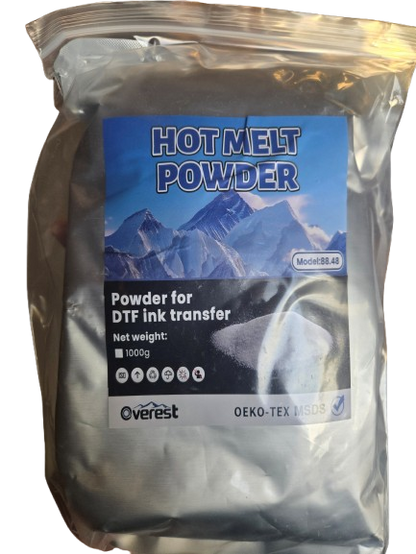 A 1000g bag of Verest Hot Melt Powder for DTF Ink Transfer, shown in a silver resealable pouch with a blue and black label featuring mountain graphics.
